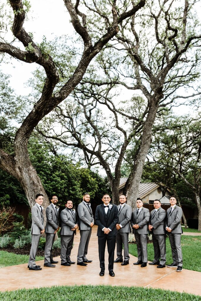 Groom and groomsmen in form wear at a San Antonio wedding venue